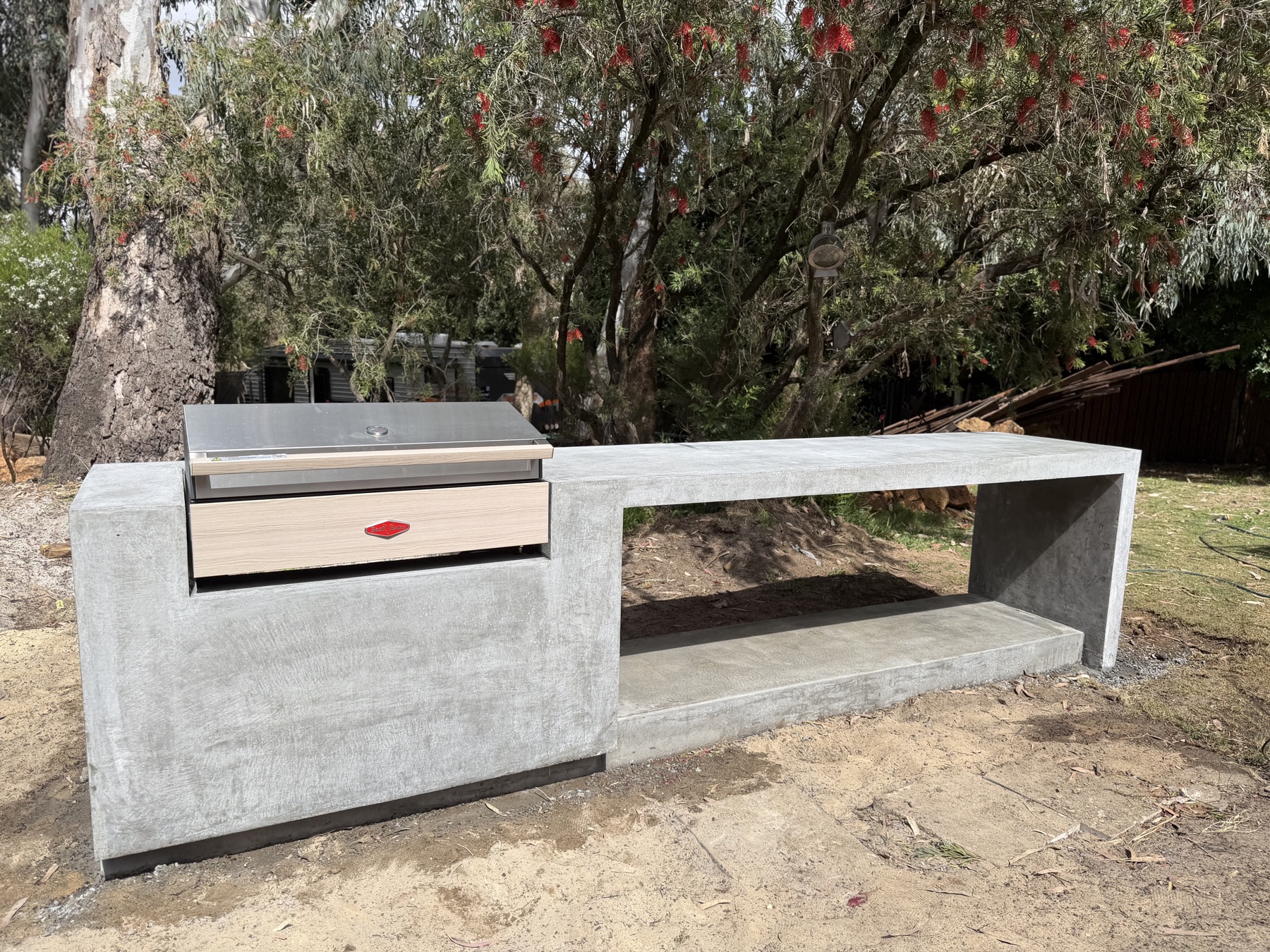 Architectural grey burnish BBQ kitchen bench in Kalamunda, cantilevered shelf and built-in grill